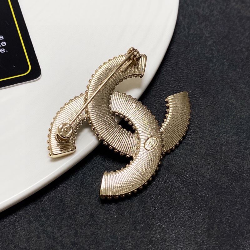 Ch**el brooches
